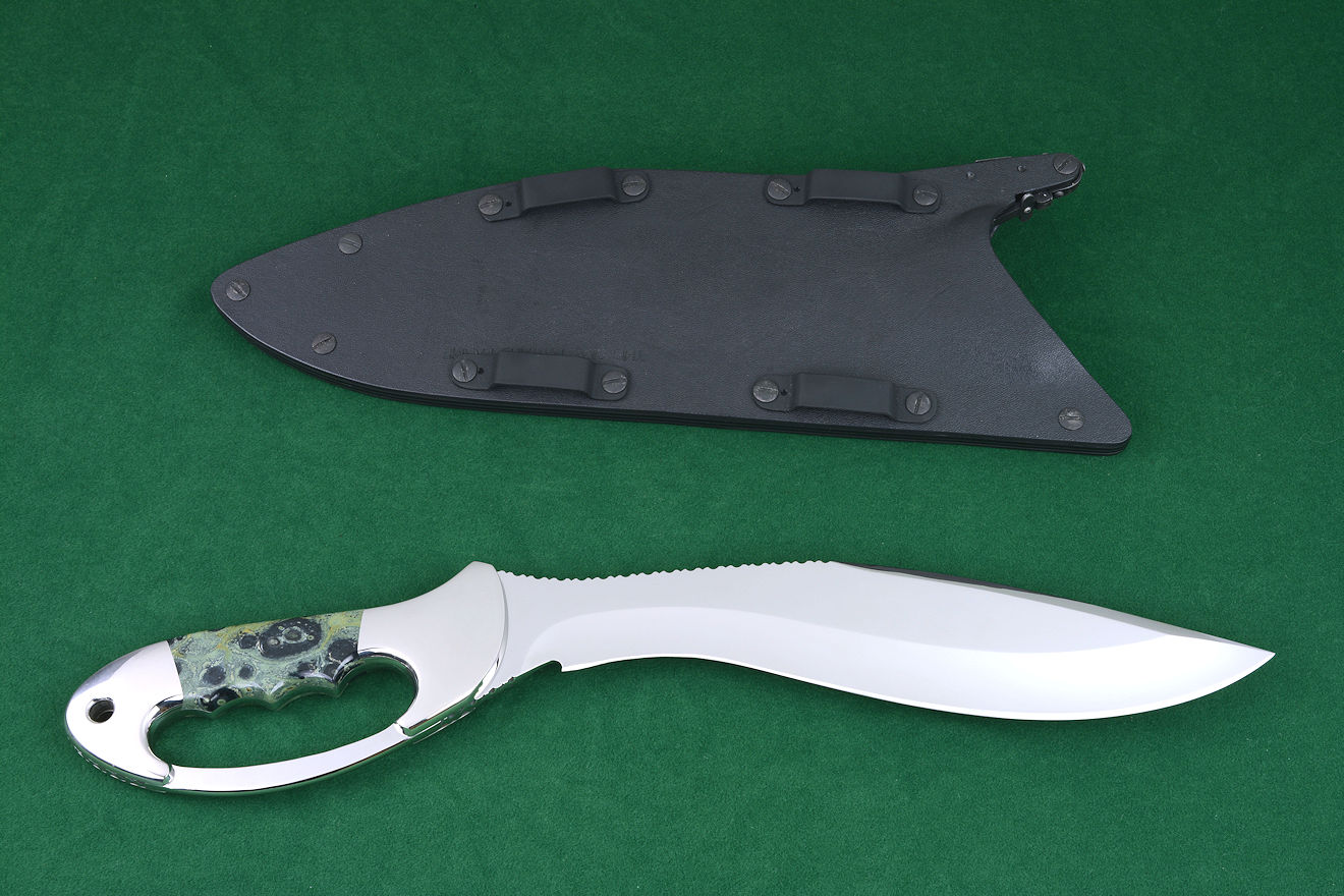 "Ananke" custom handmade khukri knife, reverse side view showing locking sheath back with traditional belt loops