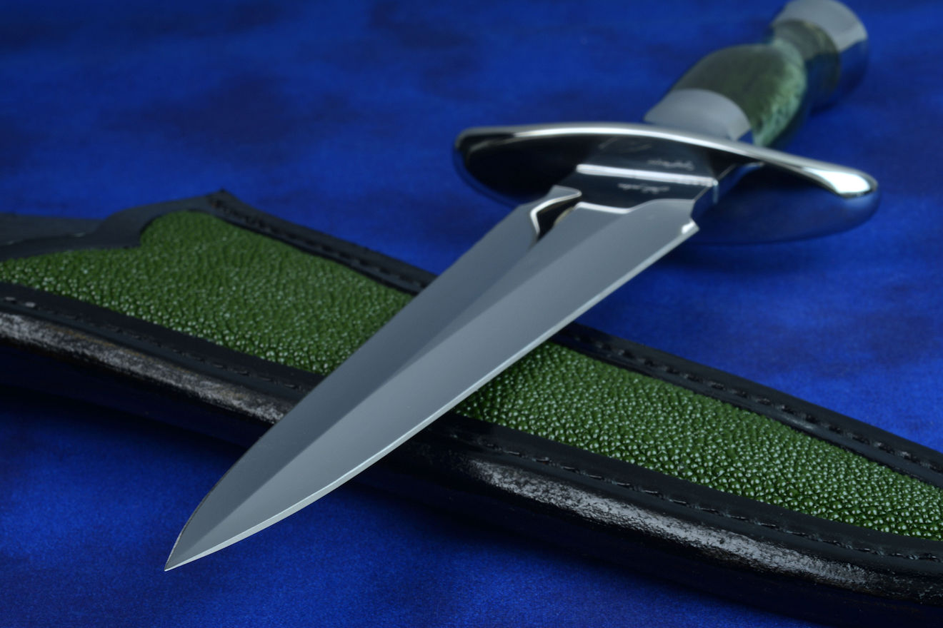 "Daqar" dagger, obverse side view in CPM154CM powder metal technology stainless steel blade, 304 stainless steel guard and pommel, Nephrite Jade gemstone handle, hand-carved leather sheath inlaid with rayskin