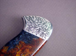 "Altair" reverse side rear bolster engraving detail. Rear hawk's bill bolster makes it easy to unsheath knife.