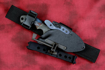 "Krag" tactical, counterterrorism, crossover knife, sheathed, UBLX, HULA view in ATS-34 high molybdenum martensitic stainless steel blade, 304 stainless steel bolsters, multicolored tortoiseshell  G10 fiberglass/epoxy composite handle, hybrid tension tab-locking sheath in kydex, anodized aluminum, black oxide stainless steel and anodized titanium