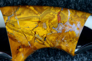 "Raptor" fine custom handmade karambit knife, 6 power enlargement of Polvadera Jasper-Agate gemstone handle, note crystal pockets and colorful complexity