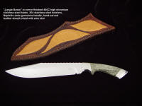 "Jungle Bowie" custom knife, obverse side view in 440C high chromium stainless steel blade, 304 stainless steel bolsters, Nephrite Jade gemstone handle, emu skin inlaid in hand-carved leather sheath